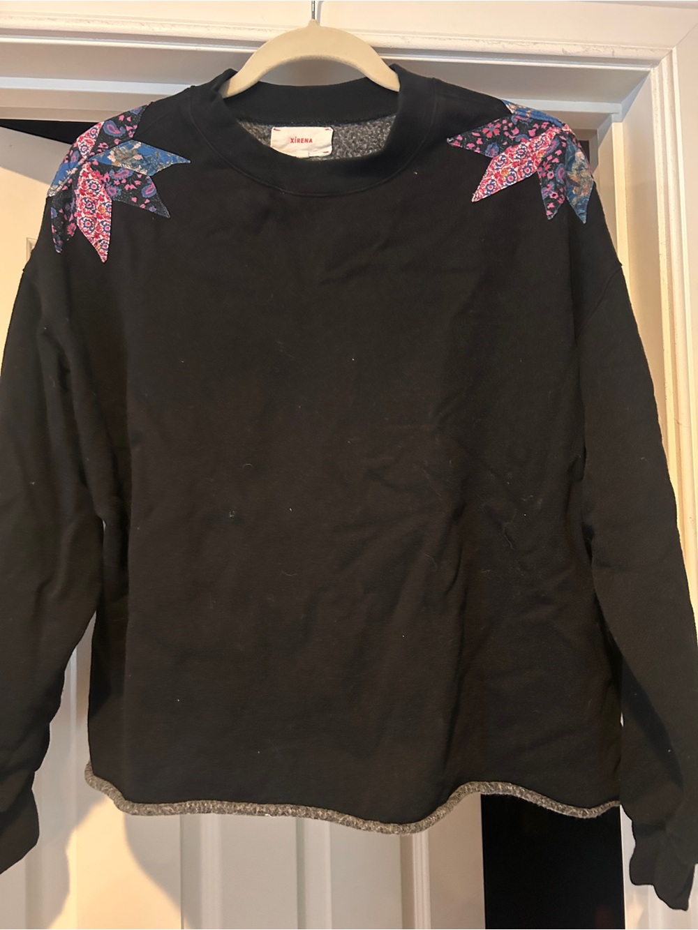 Black Sweatshirt with patchwork Floral Shoulder Accents Raw hem bottom